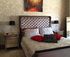 beautiful bedroom of chandelier suite