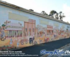 Parilla Community Market logo
